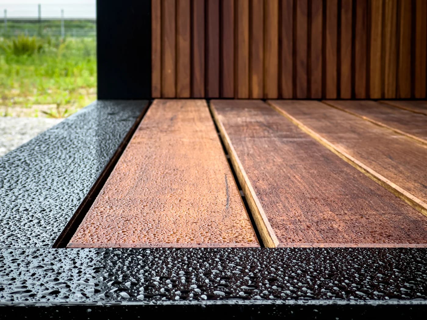 Photograph of timber decking at the edge of the sauna terrace